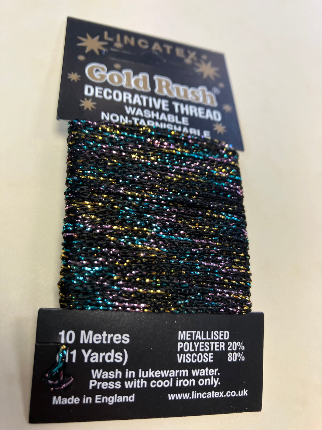 Black multi metallic thread