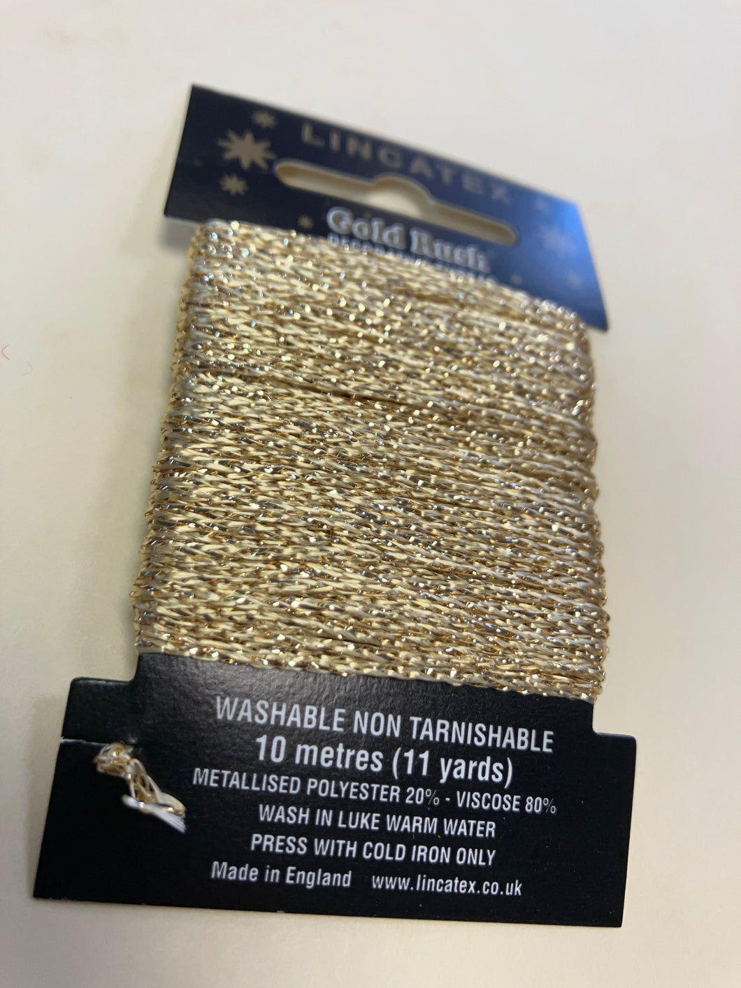 Gold metallic thread